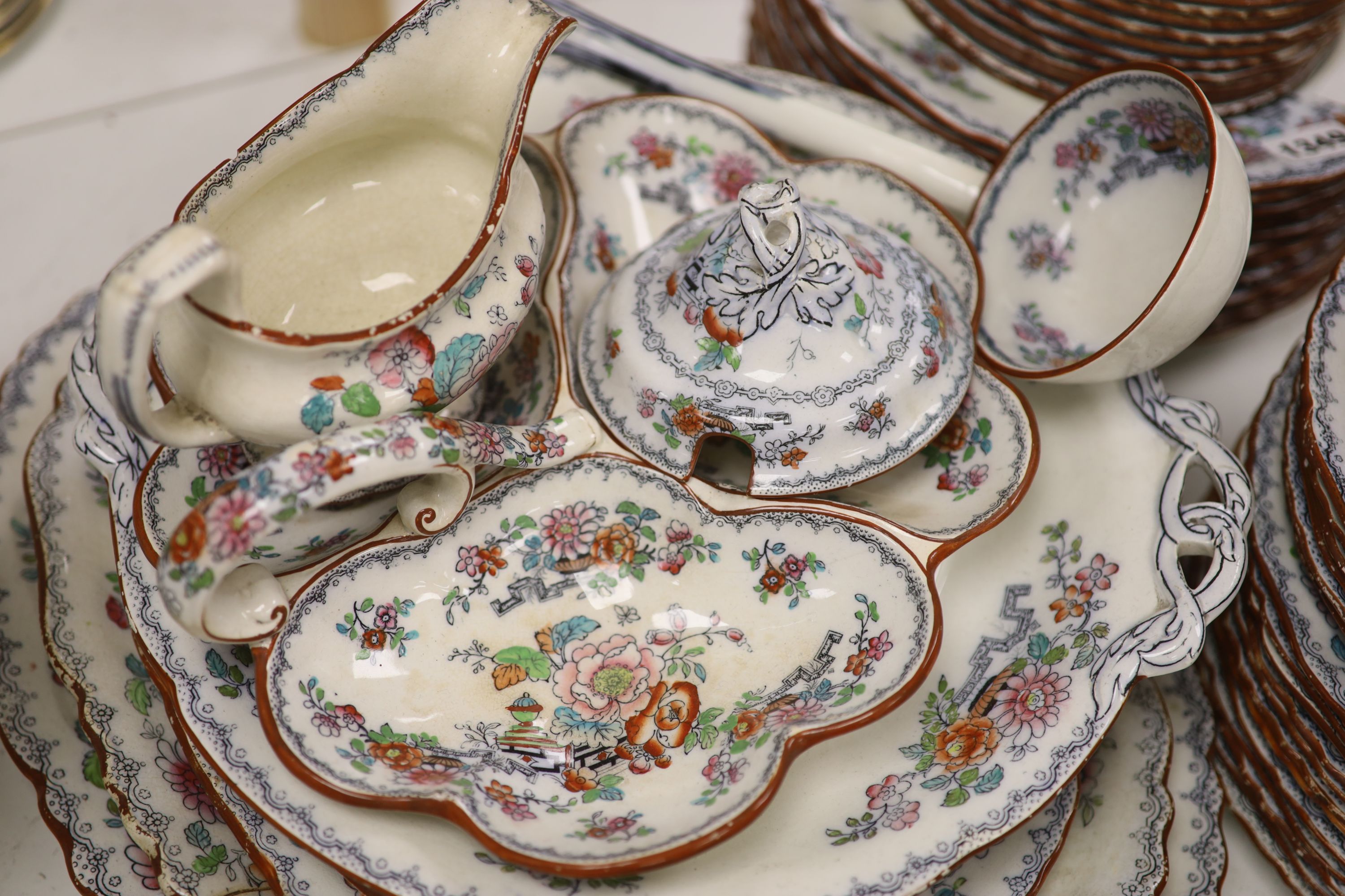 A Victorian Ashworth ironstone part dinner service